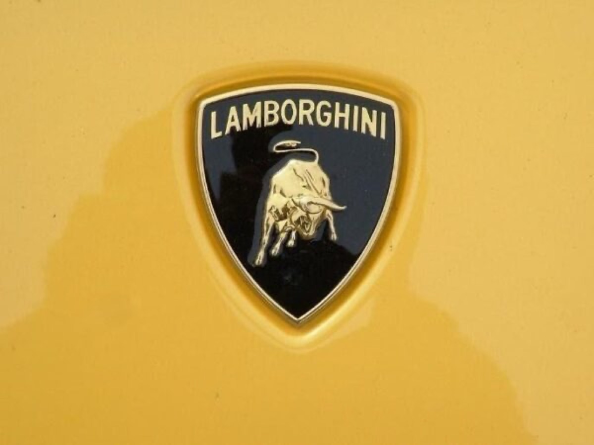 Lamborghini's gold and yellow logo signaling premium luxury